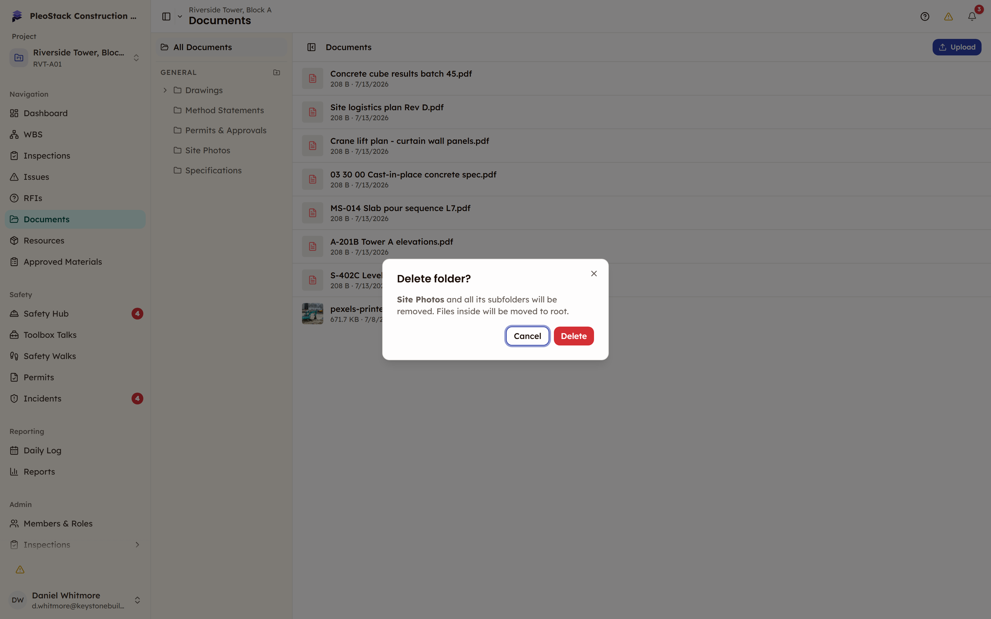The Delete folder dialog explaining that subfolders will be removed and files inside will be moved to root