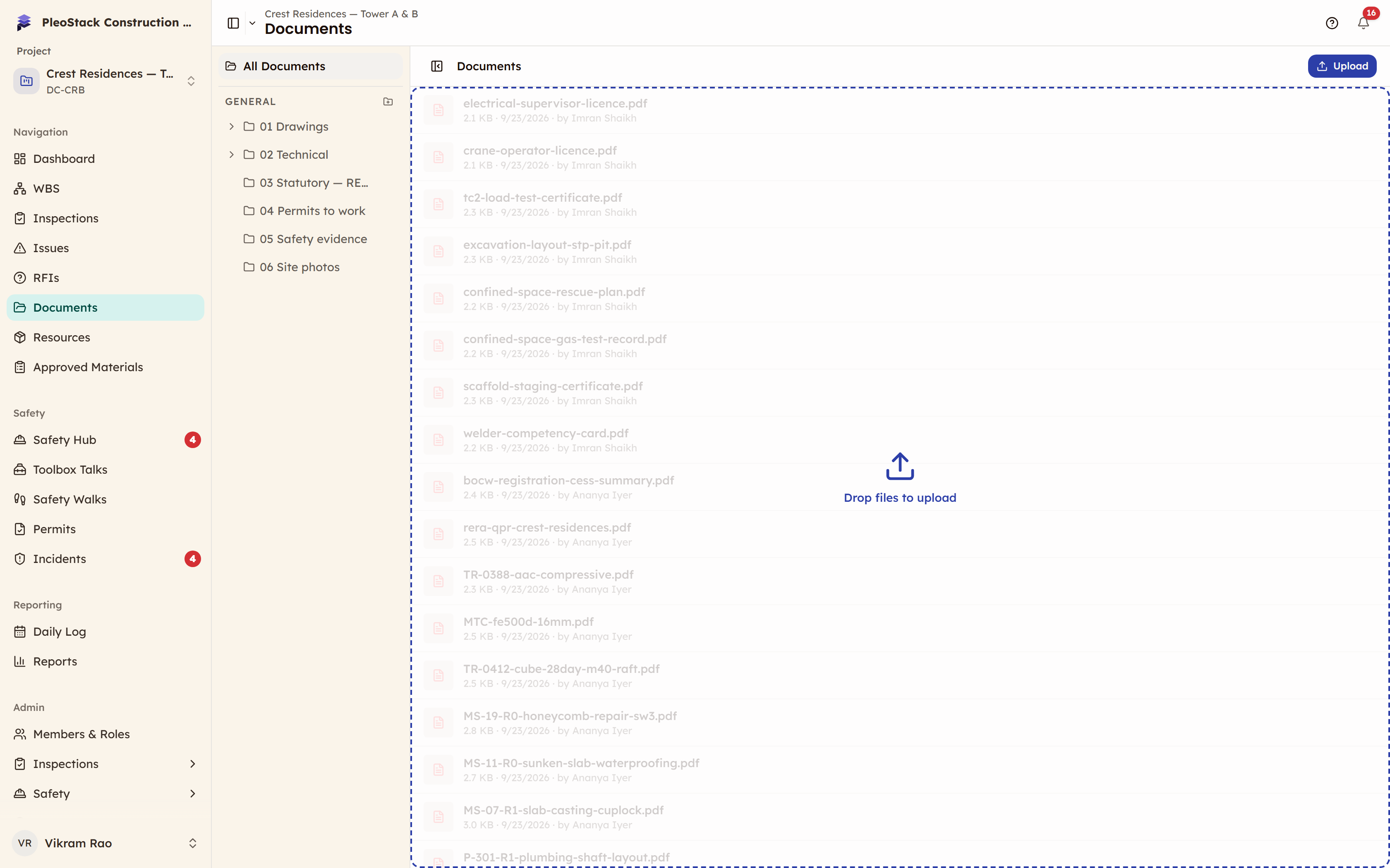 The file list with files being dragged over it and the panel reading Drop files to upload