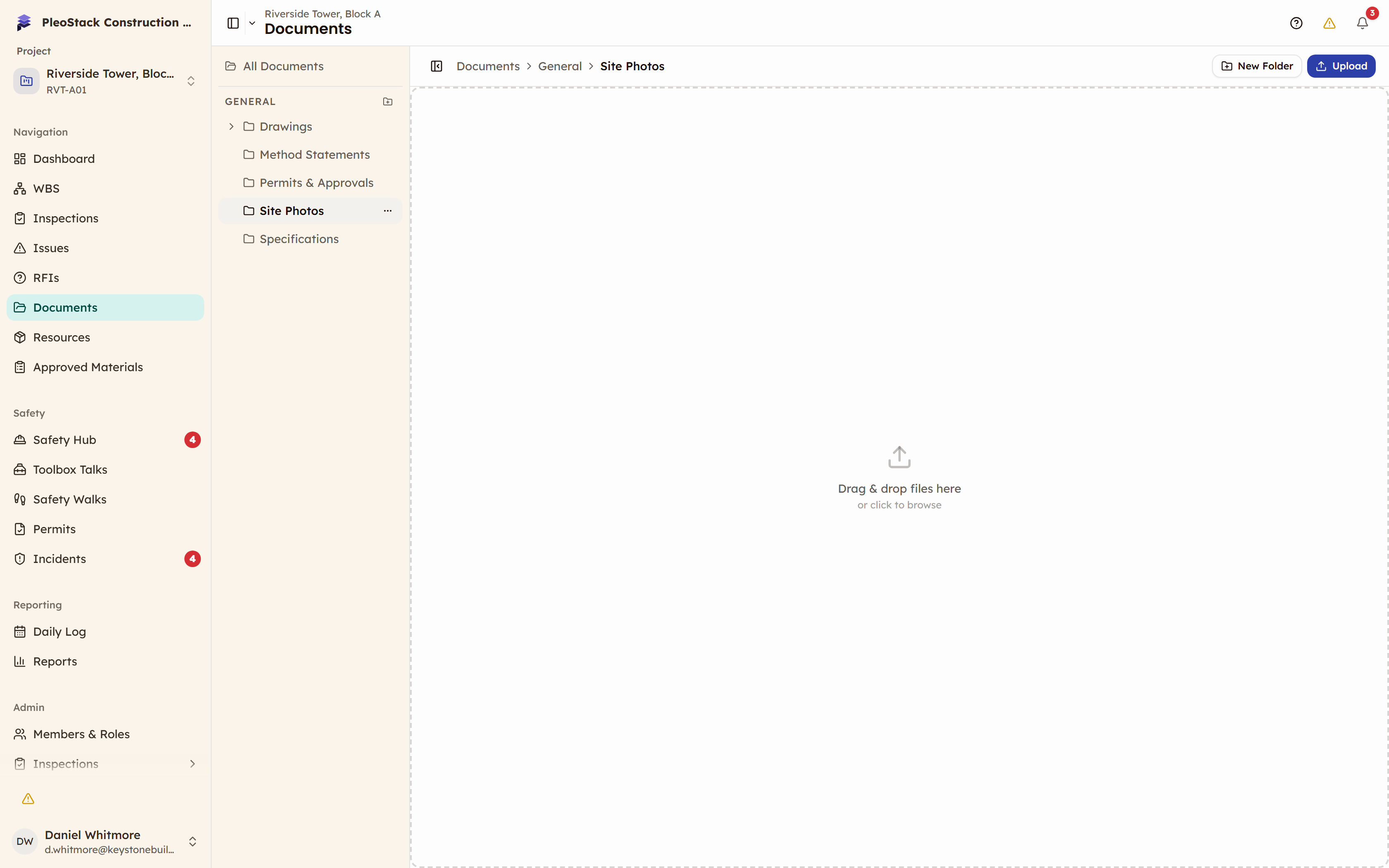 An empty Documents library showing the dashed drop target reading Drag and drop files here